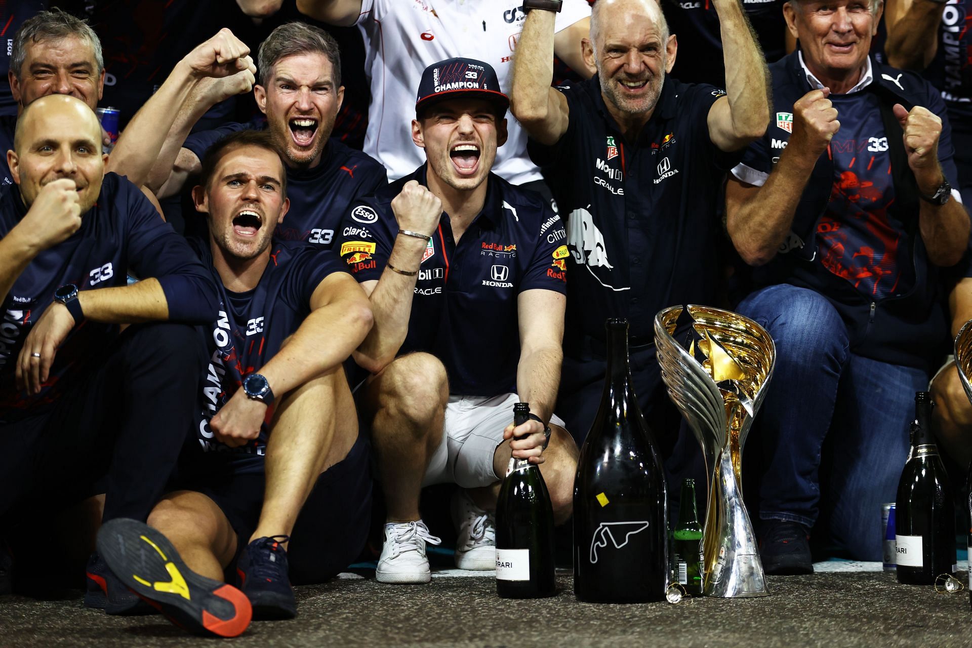 Max Verstappen celebrates his maiden world championship with his Red Bull team in Abu Dhabi.