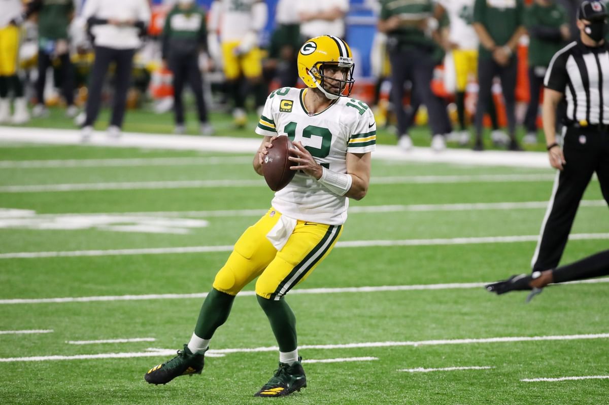 What is Aaron Rodgers' record against the Detroit Lions?
