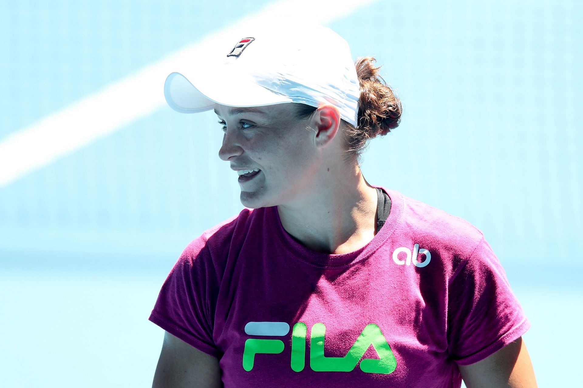 Barty smiles during a practice session ahead of the 2022 Australian Open