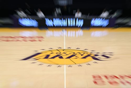 Lakers' logo seen on the basketball court during an NBA game.