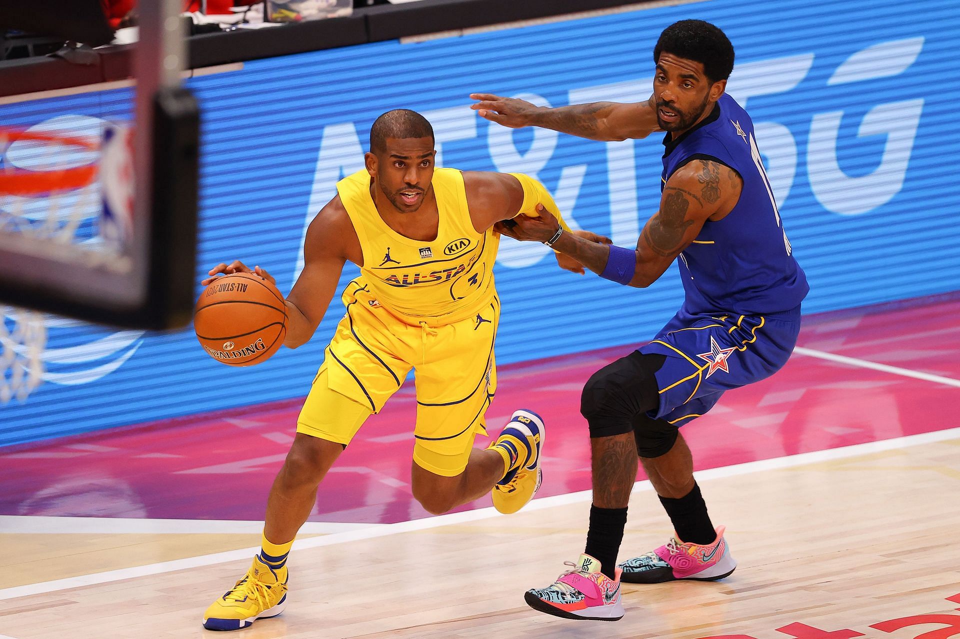 Chris Paul of Team LeBron is defended by Kyrie Irving of Team Durant during tthe 70th All-Star Game