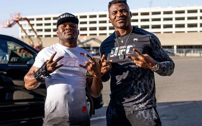 Kamaru Usman reacts to Francis Ngannou's successful title defense at UFC 270