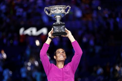 Rafael Nadal with the 2022 Australian Open trophy.