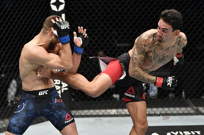 What is Max Holloway's walk-around weight?