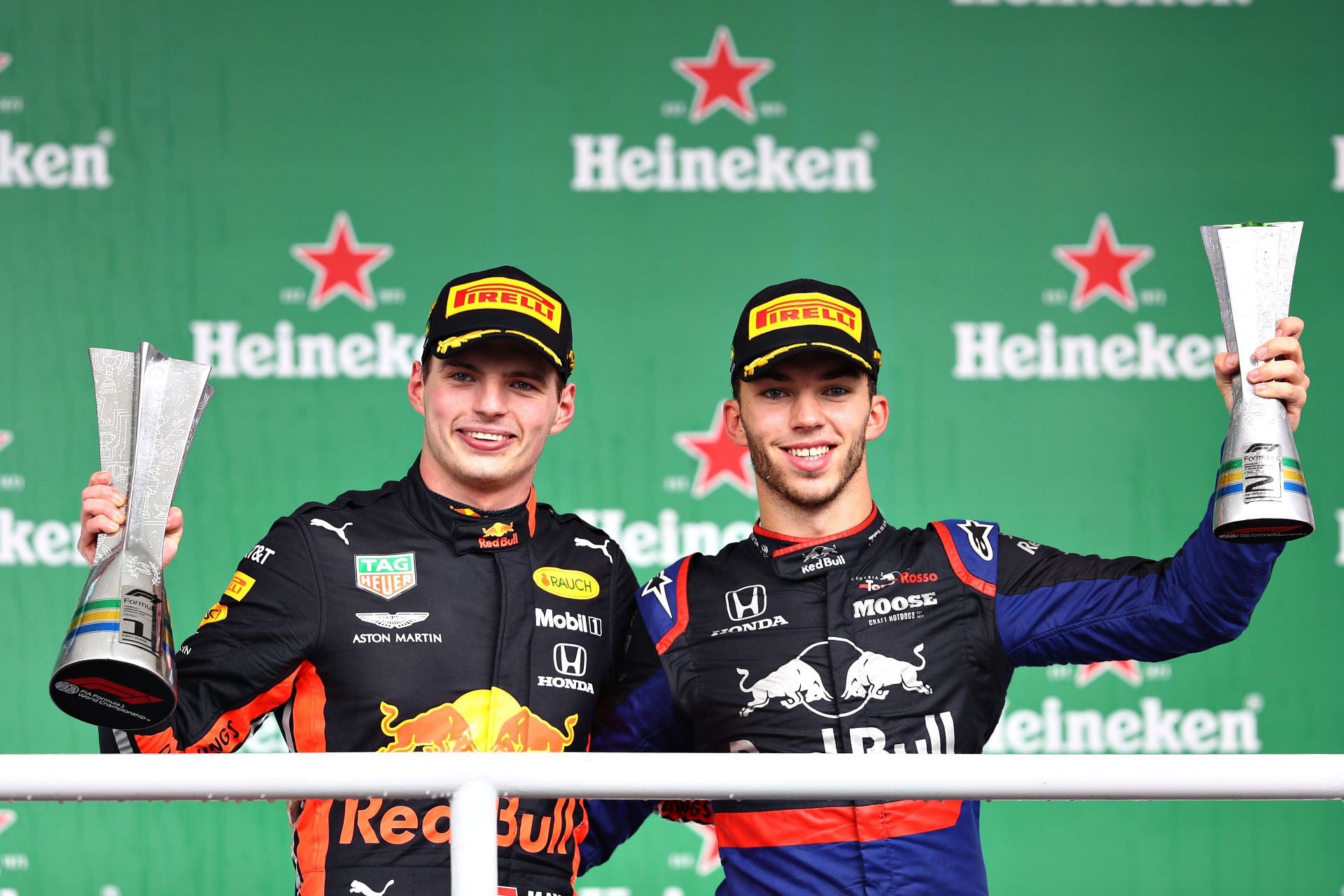 Pierre Gasly (right) previously drove for Red Bull alongside Max Verstappen (left) in 2019