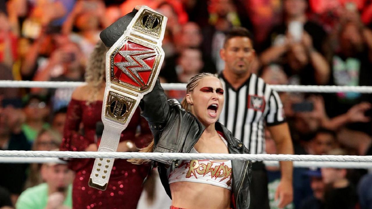 Ronda Rousey holding the RAW Women&#039;s title