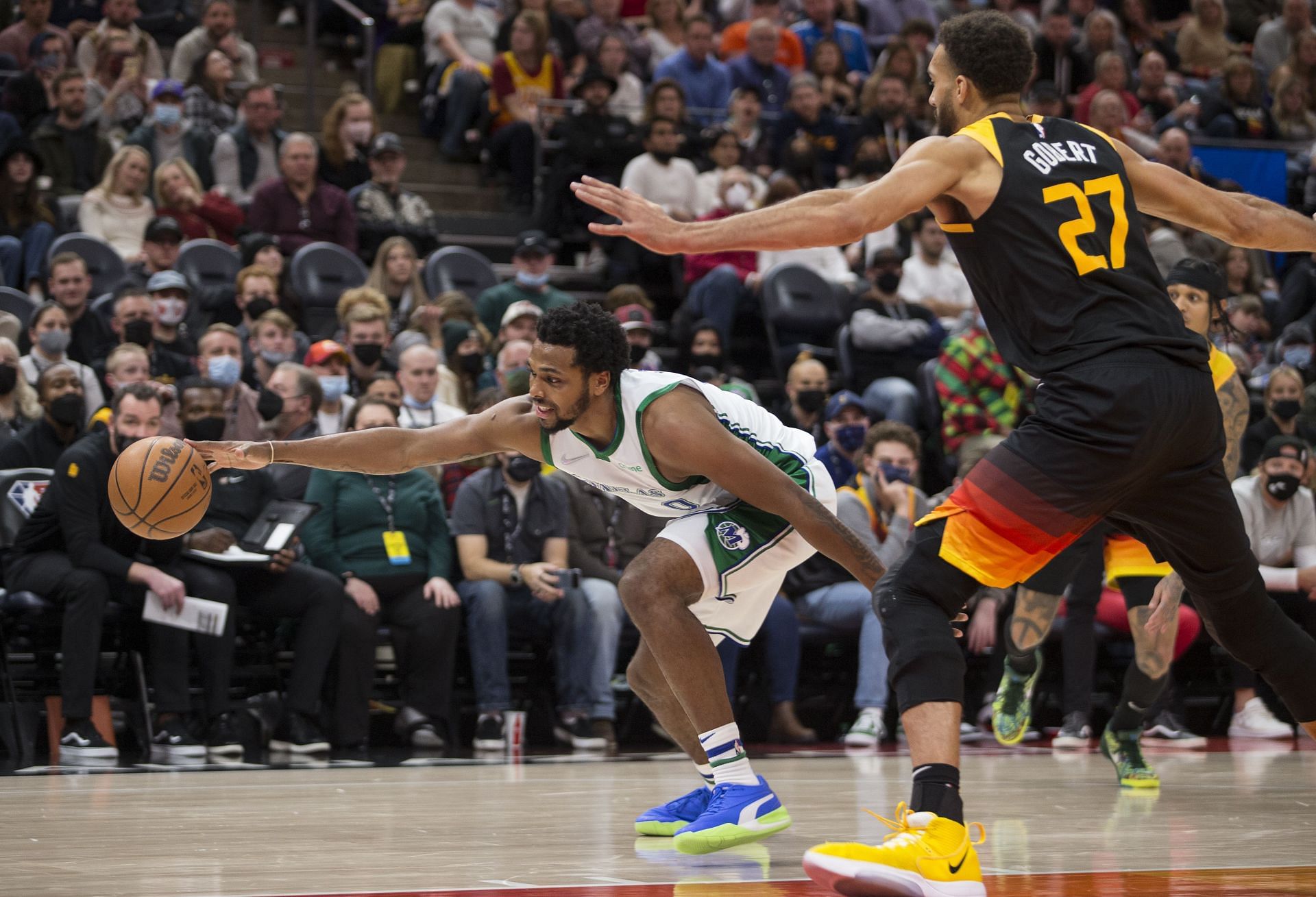 Sterling Brown attempts to save the ball from going out of bounds.