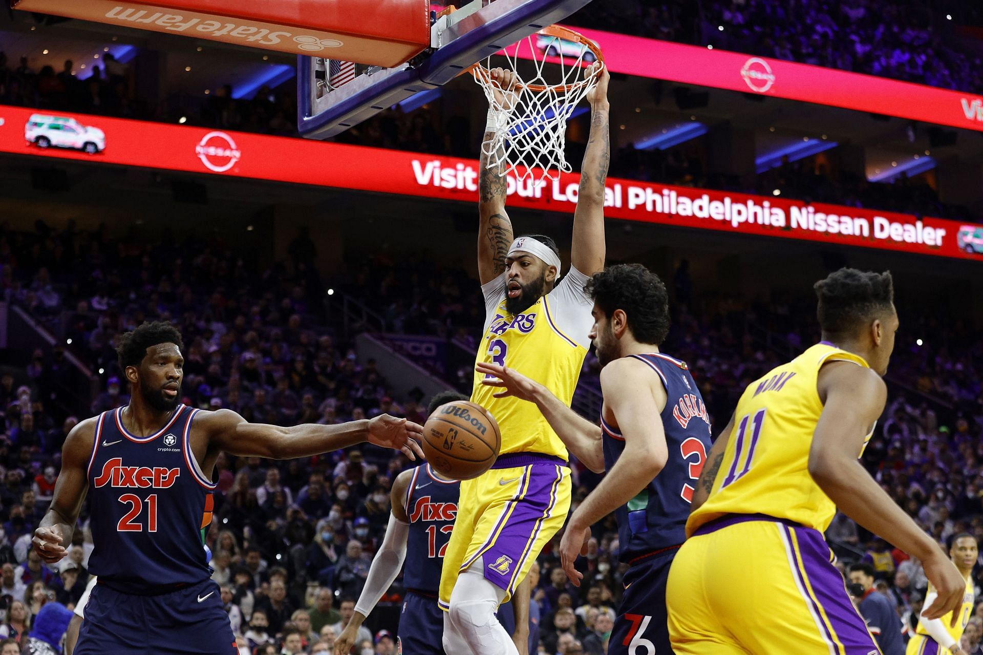 Anthony Davis #3 of the Los Angeles Lakers dunks against the Philadelphia 76ers