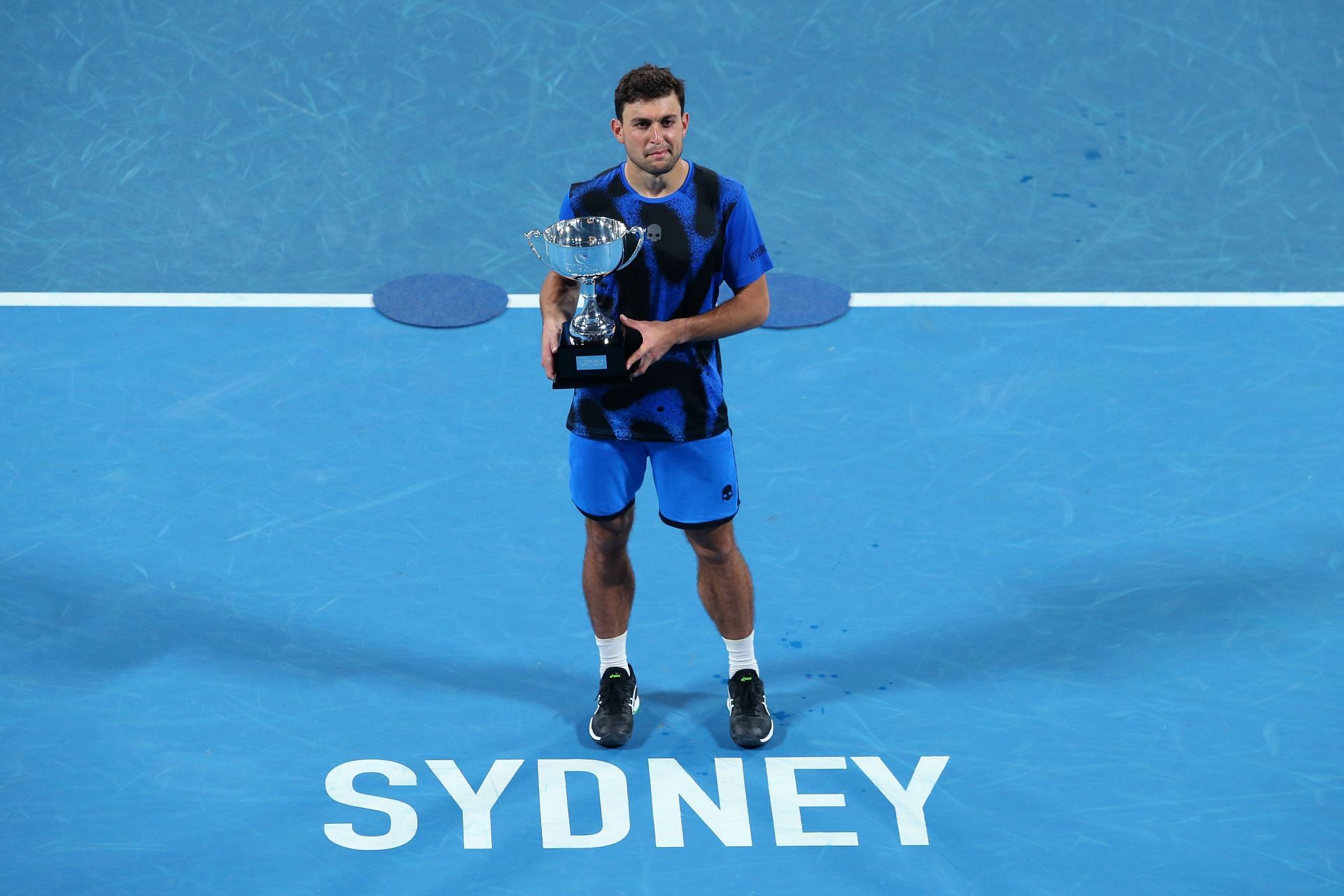 Aslan Karatsev with the Men&#039;s Singles trophy after winning the Sydney Tennis Classic on Saturday in Sydney, Australia