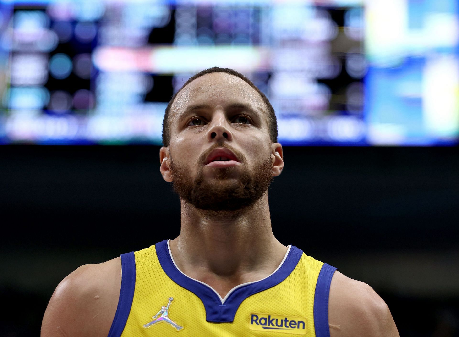 Steph Curry #30 of the Golden State Warriors reacts while taking on the Dallas Mavericks in the third quarter at American Airlines Center on January 05, 2022 in Dallas, Texas.