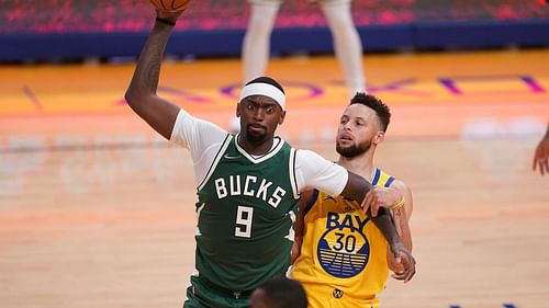 Bobby Portis and Steph Curry in action during an NBA game [Source: NBC Sports]