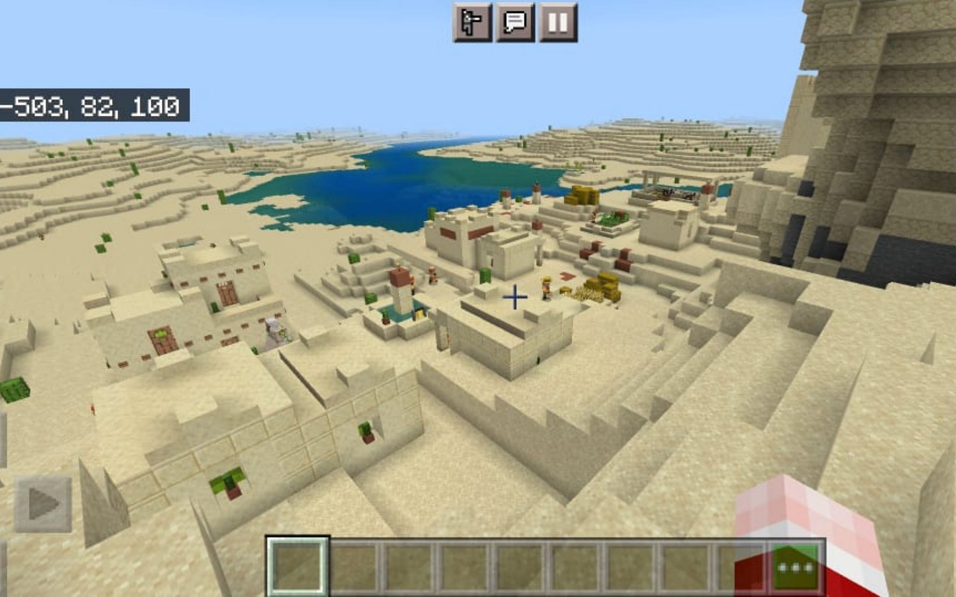 Una aldea del desierto no muy lejos del engendro (Imagen a través de Minecraft)