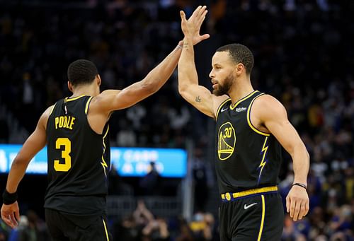 Golden State Warriors guards Stephen Curry and Jordan Poole