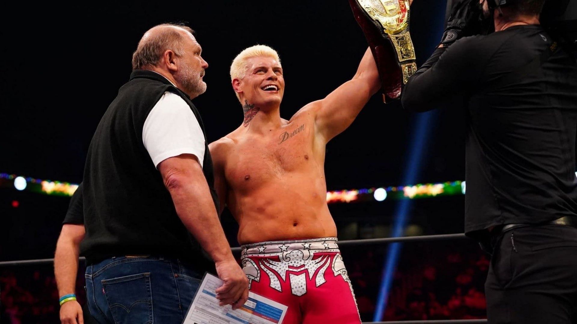 Cody Rhodes with Arn Anderson and the TNT championship
