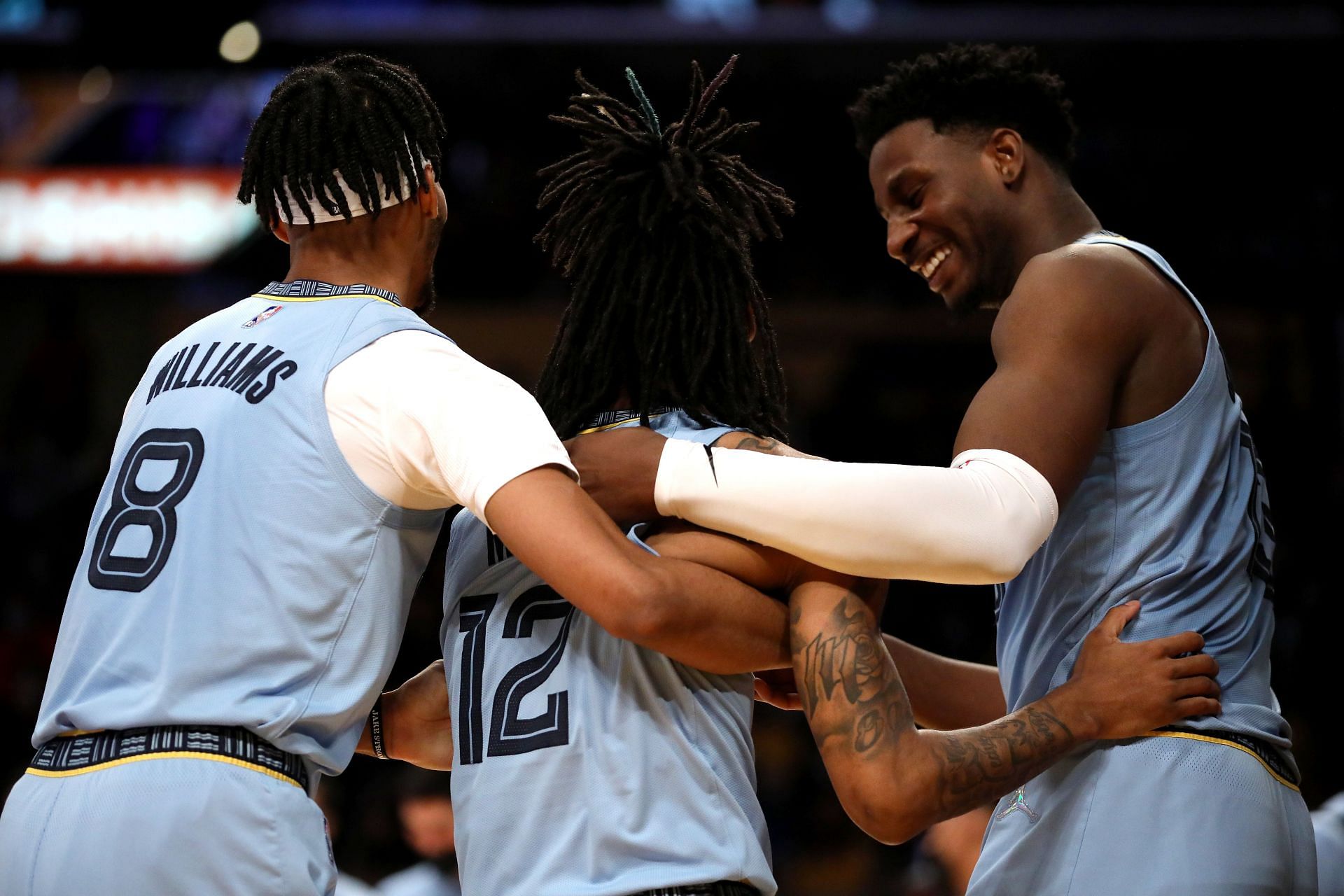 Grizzlies players celebrate a play.