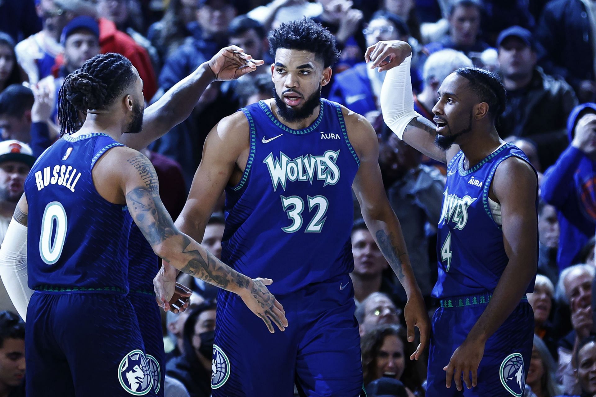 D'Angelo Russell, Karl-Anthony Towns and Jaylen Nowell