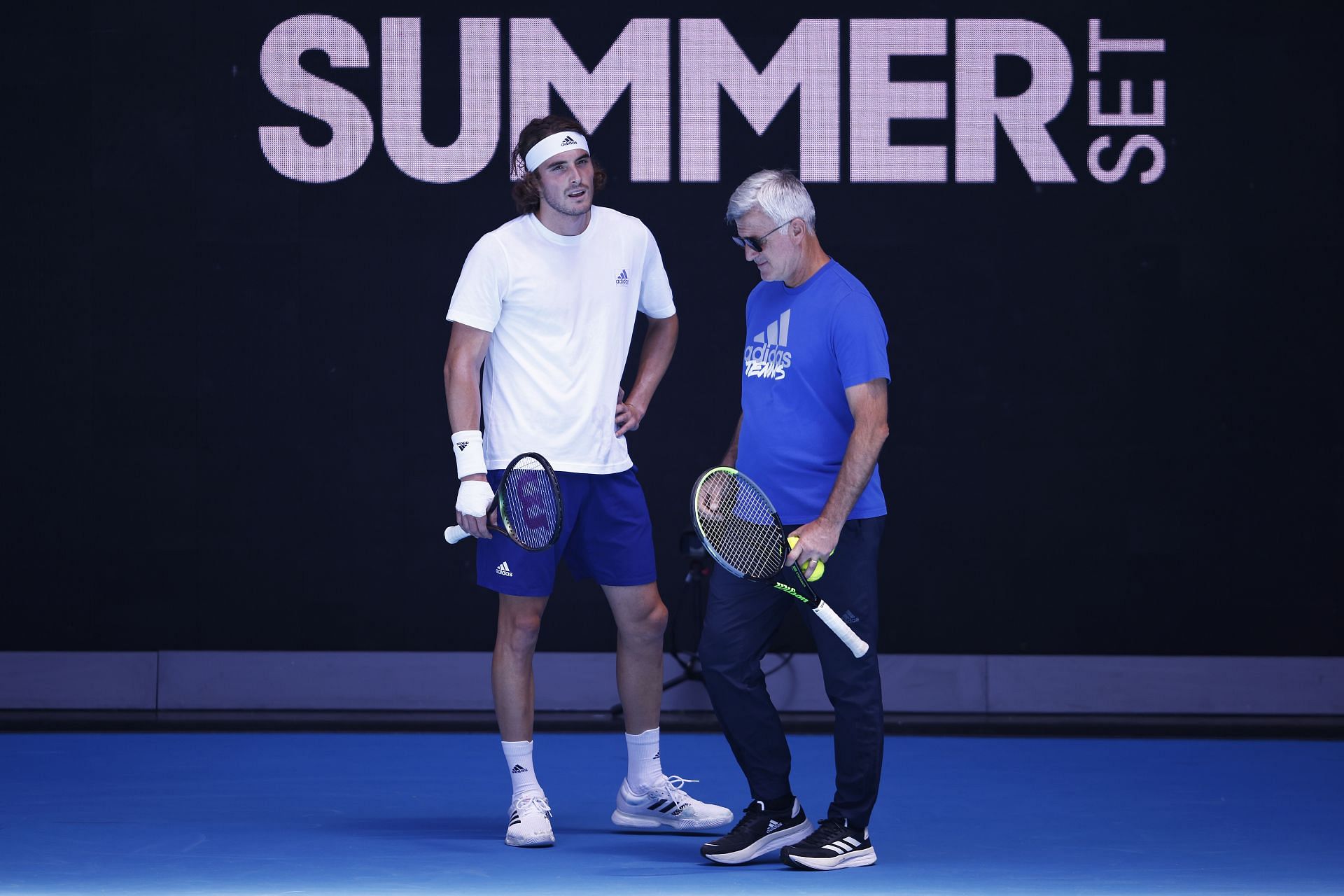 Stefanos Tsitsipas (L) with his father at 2022 Melbourne Summer Set