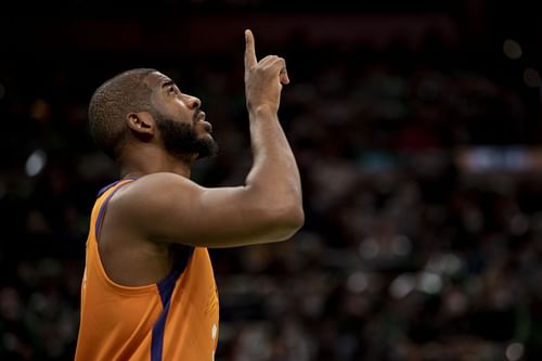 Chris Paul #3 of the Phoenix Suns reacts before a game against the Boston Celtics at TD Garden on December 31, 2021 in Boston, Massachusetts.