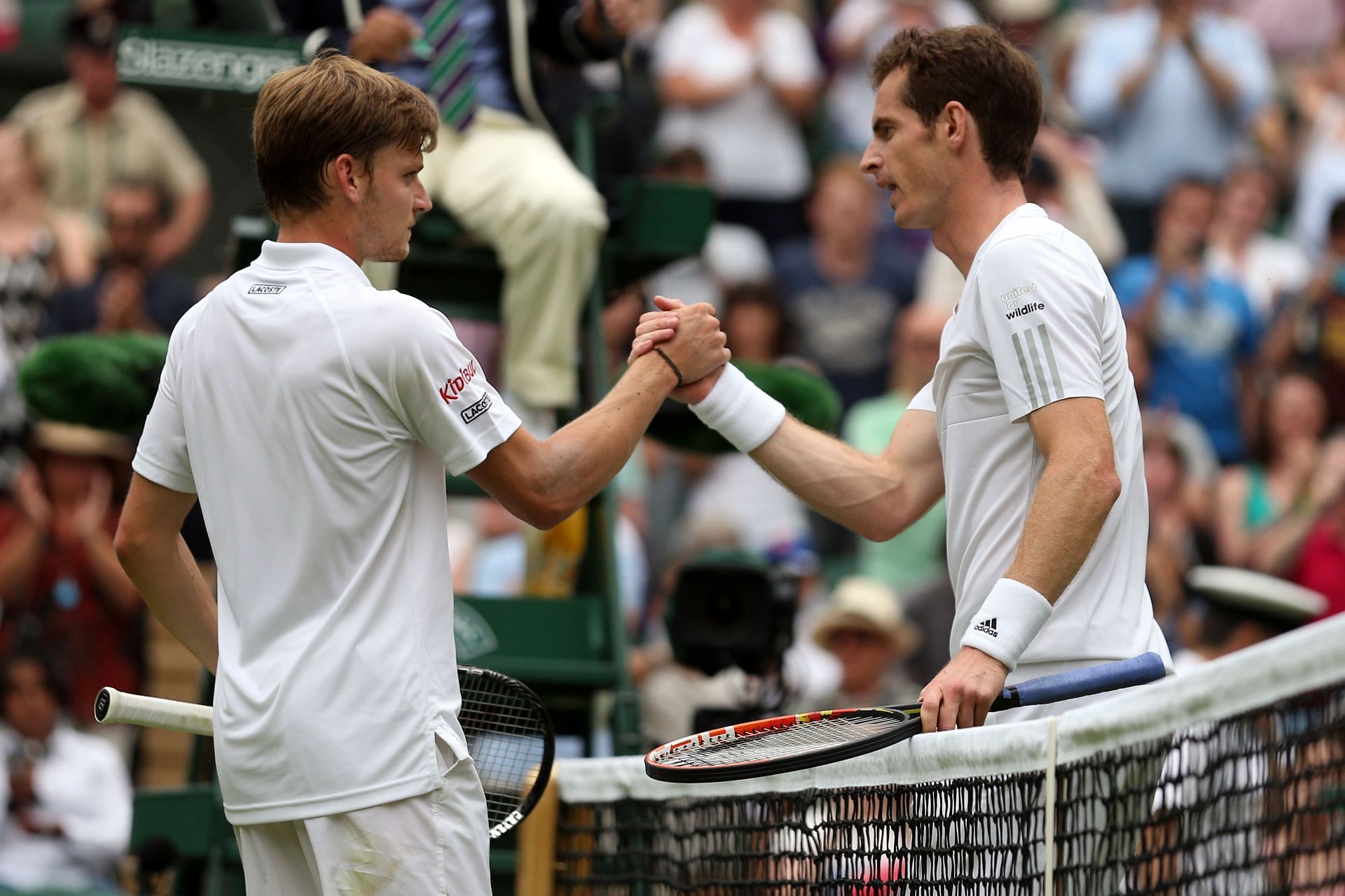 David Goffin with Andy Murray at Wimbledon 2014