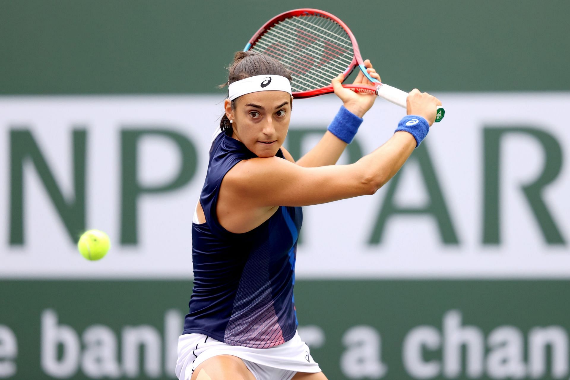 Caroline Garcia attempts to slice during a match at BNP Paribas Open