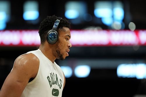 Milwaukee Bucks star Giannis Antetokounmpo warms up before a game.