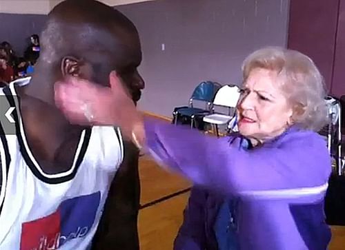 Betty White was probably the only person caught slapping Shaquille O'Neal on camera. 