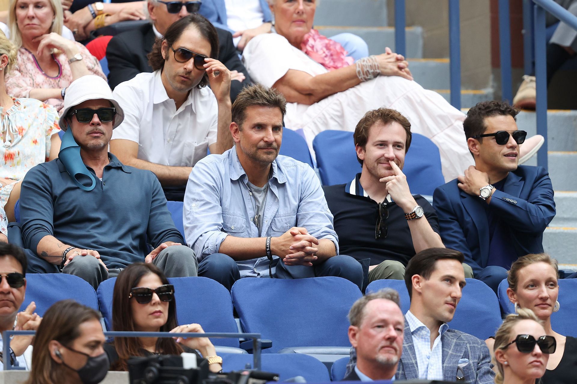 (From L-R) Brad Pitt, Bradley Cooper, Joseph Mazzello, and Rami Malek watch the US Open final between Daniil Medvedev and Novak Djokovic