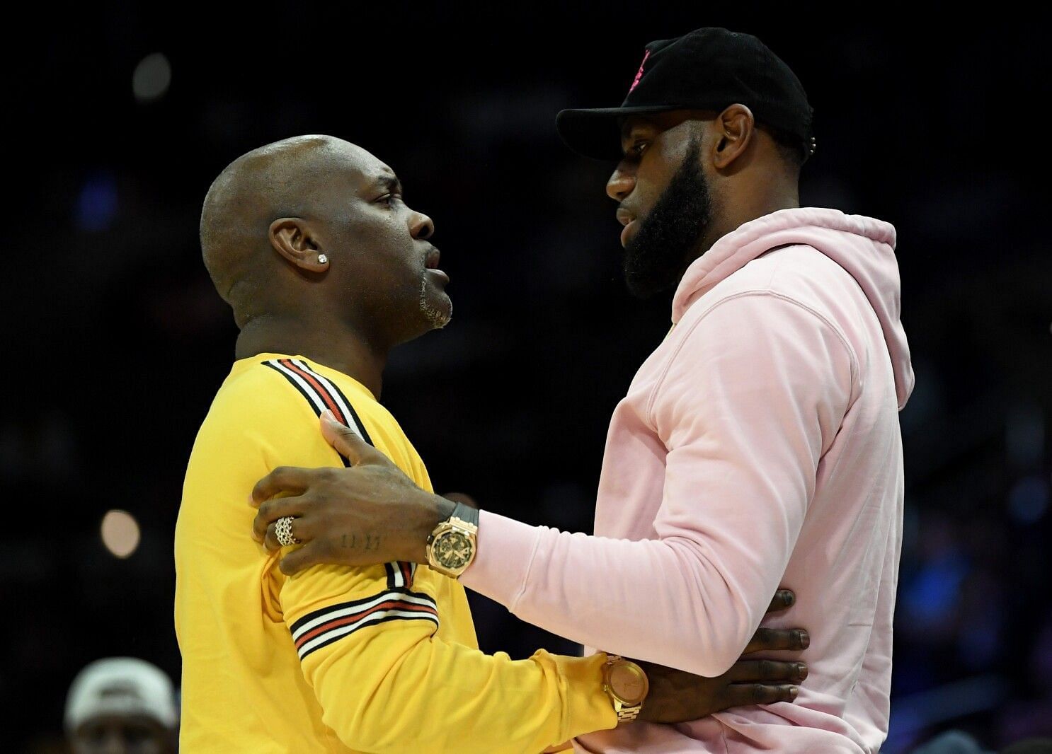 Gary Payton and LeBron James (right). (Photo Courtesy of The LA Times)
