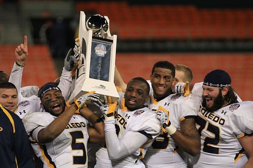 Former University of Toledo football player Desmond Marrow (center)