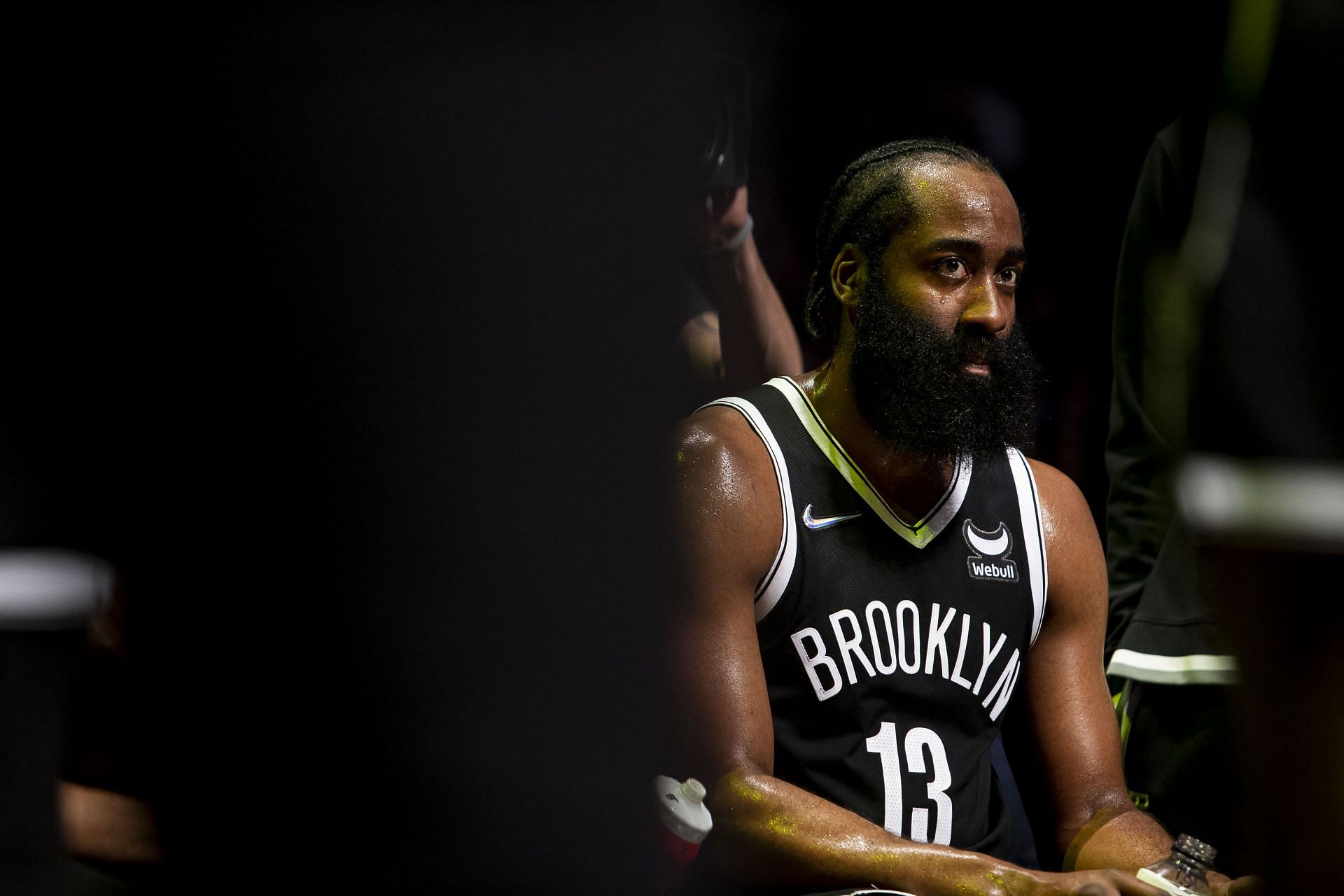 James Harden of the Brooklyn Nets rests on the bench during a timeout.
