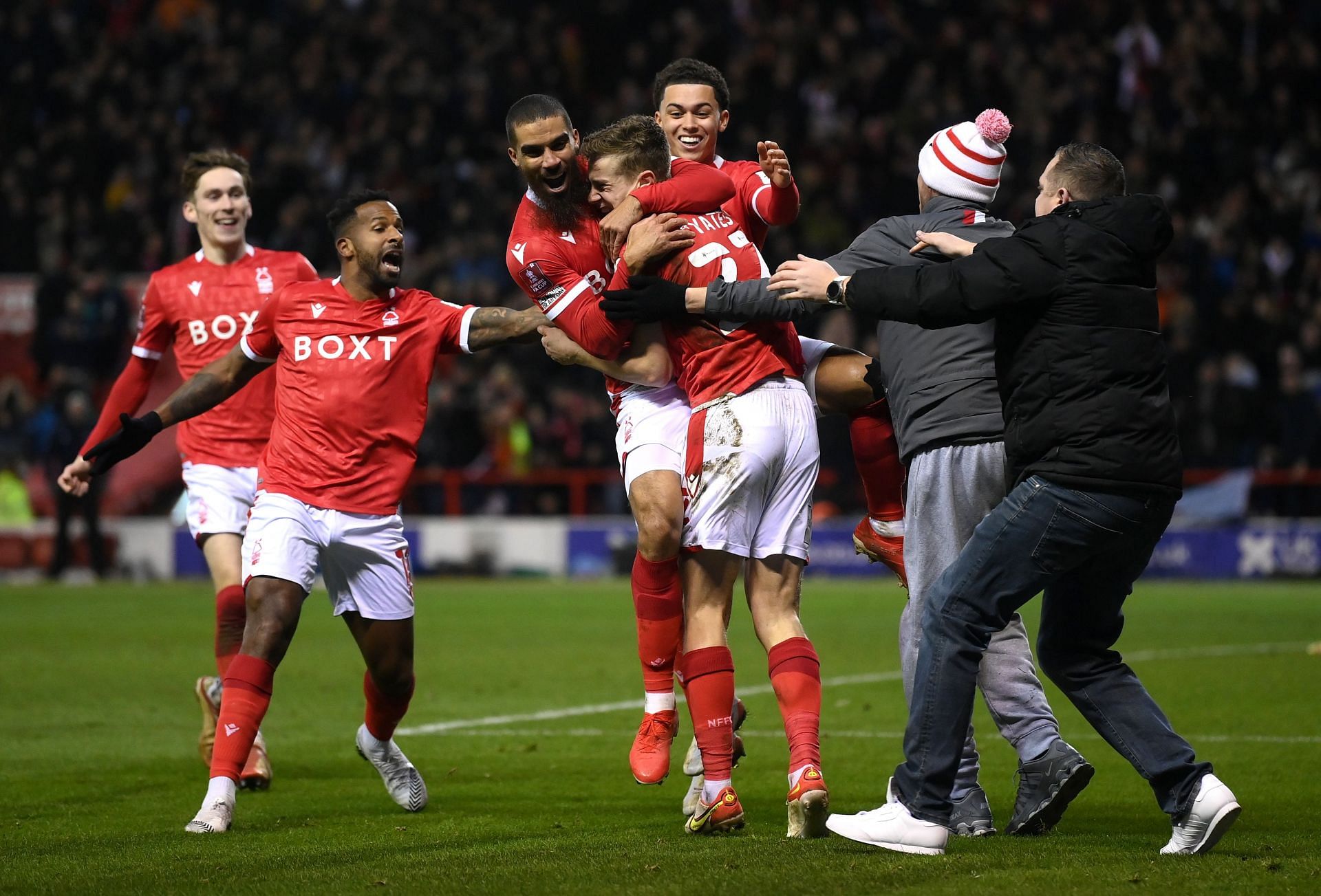 Nottingham Forest players celebrate after scoring against Arsenal.