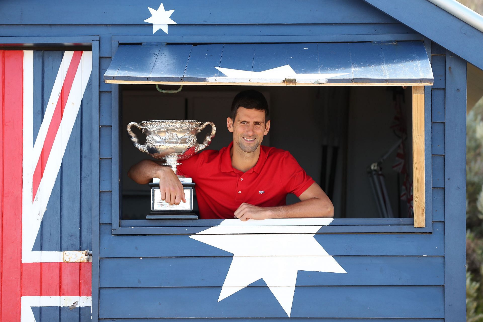 Novak Djokovic with the 2021 Australian Open trophy.