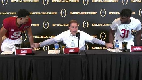 Nick Saban (C) with Bryce Young (L) and Will Anderson (R)