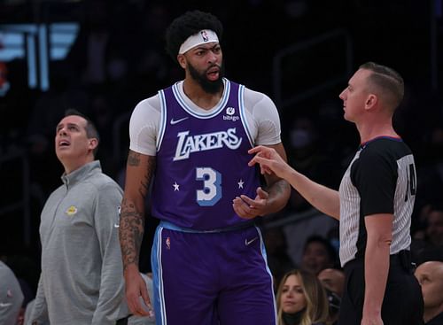 Anthony Davis #3 of the Los Angeles Lakers speaks to a referee.