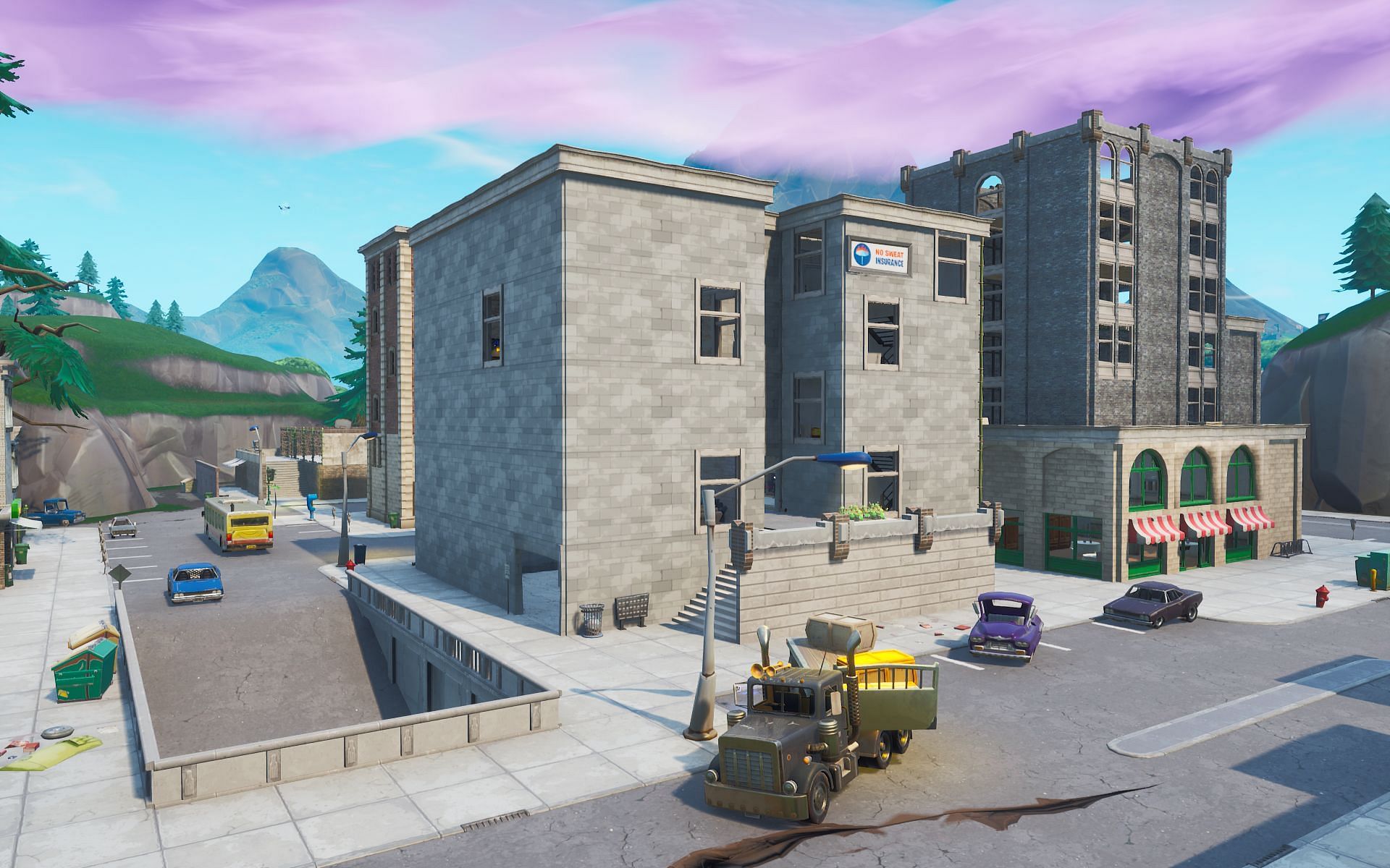 The infamous building of No Sweat Insurance is still a part of the New Tilted Towers (Image via Epic Games)