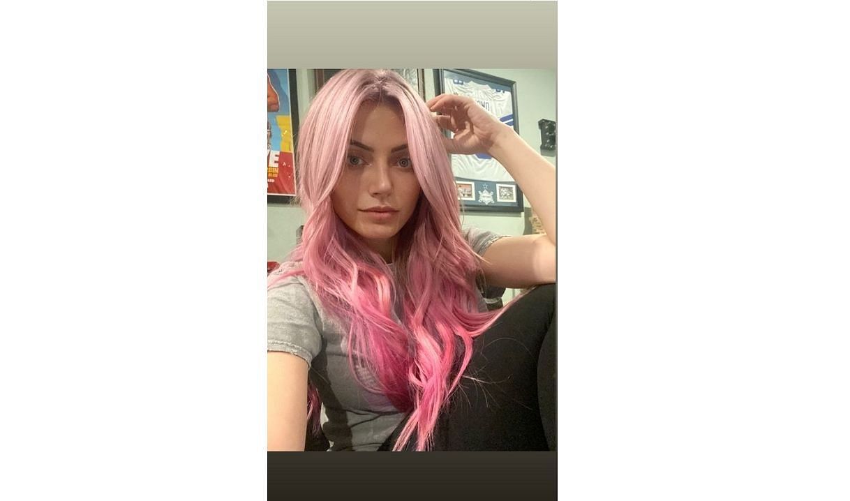 Alexa Bliss with a new look with a complete set of pink hair