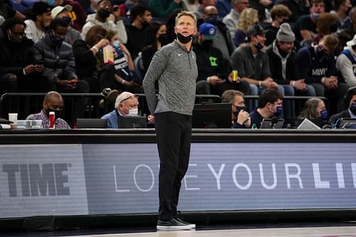 Golden State Warriors coach Steve Kerr stands during a game against Minnesota.