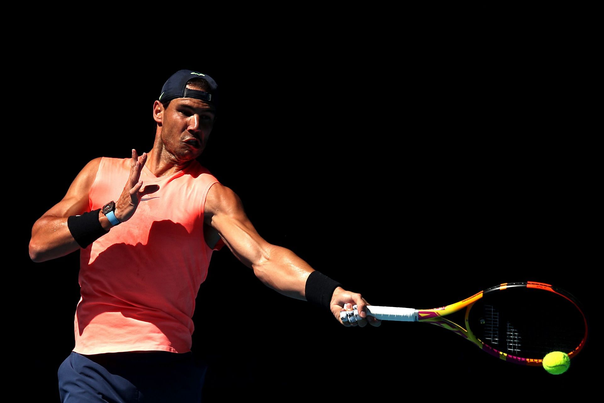 Nadal hits a forehand during his practice session at the Rod Laver Arena