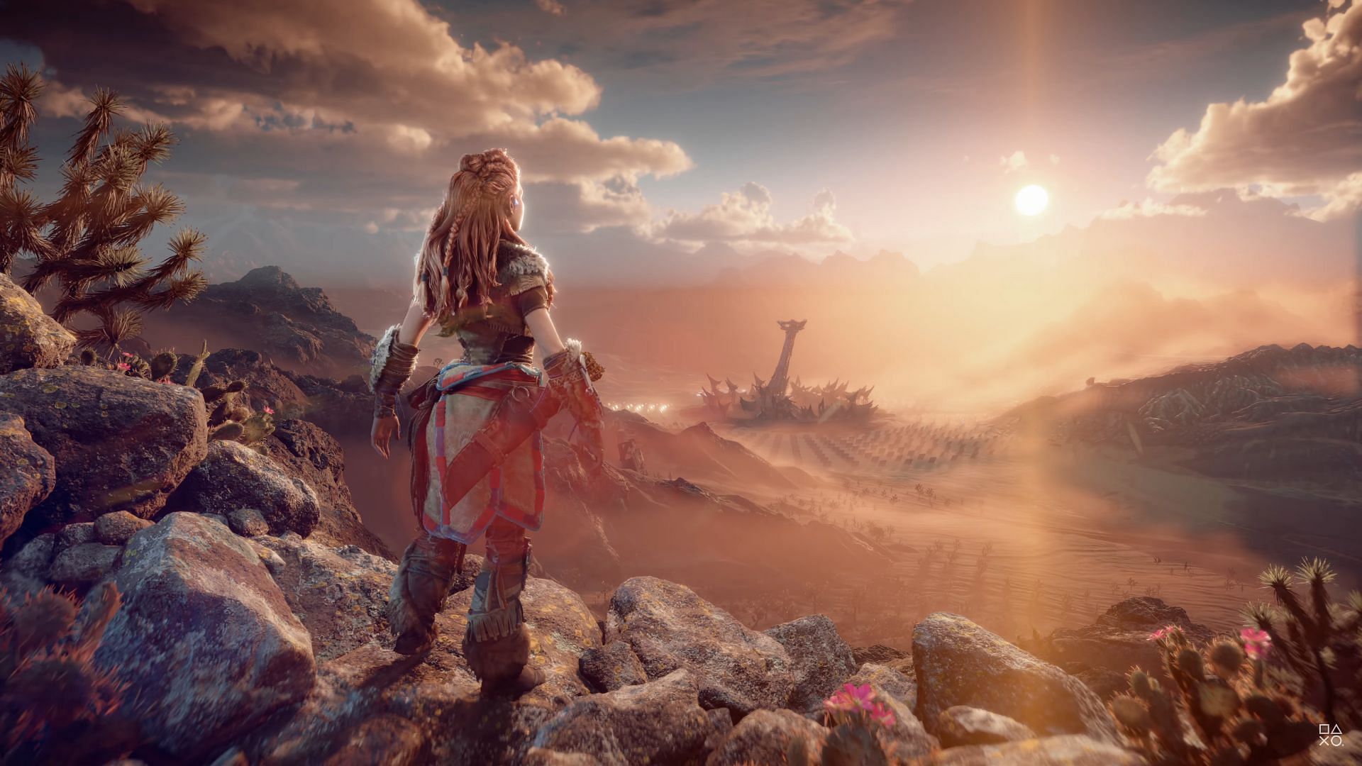 Aloy gazing out at the horizon (Image via YouTube/PlayStation)
