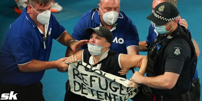 Watch: Invader dragged off court by security during Australian Open final