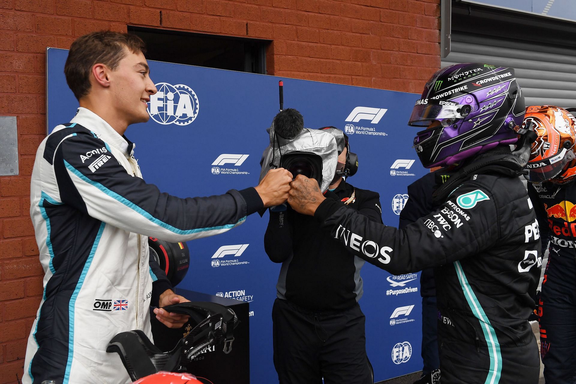 George Russell (left) and Lewis Hamilton (right) at the 2021 Belgian Grand Prix. (Photo by John Thys - Pool/Getty Images)