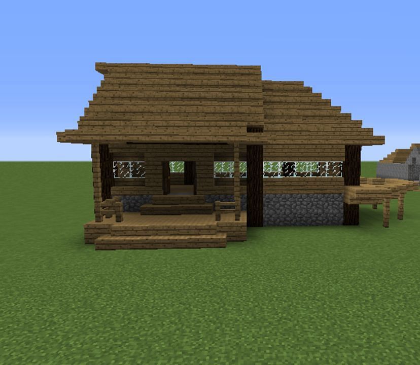 This home design is deceptively spacious and sports an outdoor porch (Image via Mojang)