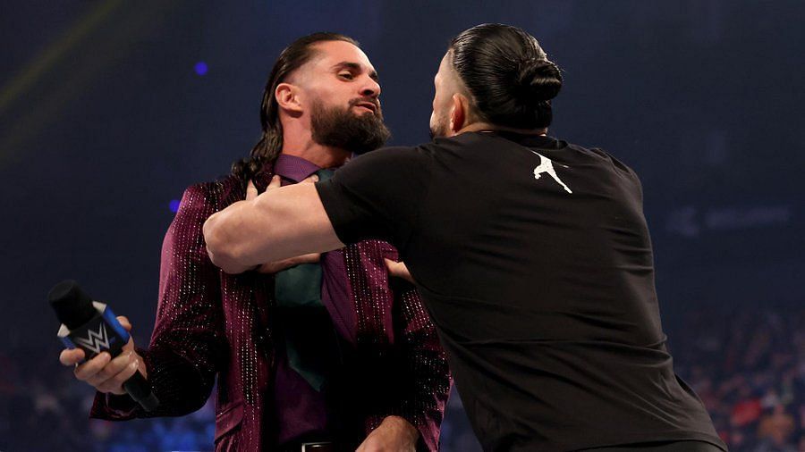 Roman Reigns shoving Seth Rollins on SmackDown