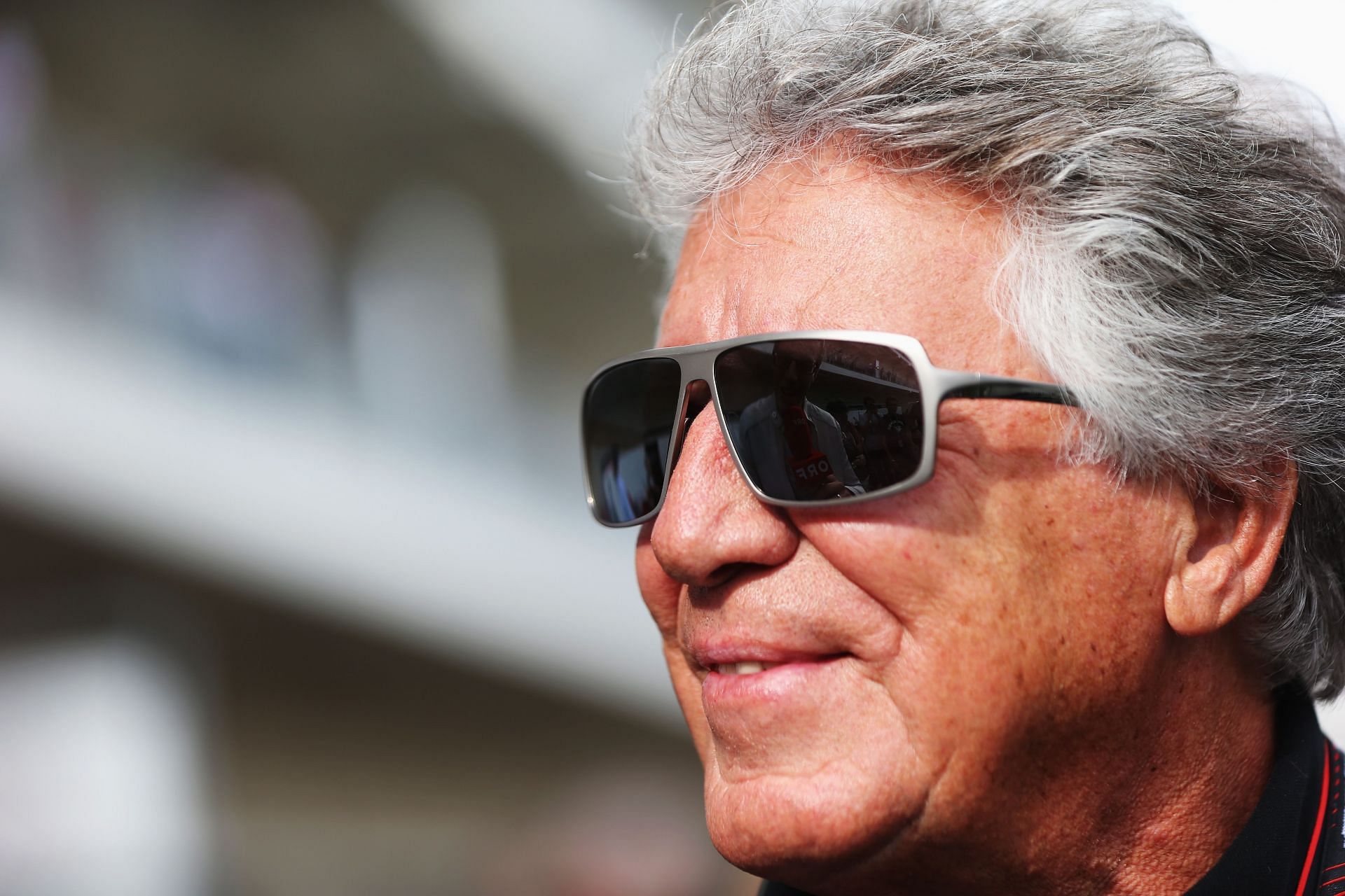 Former F1 world champion Mario Andretti is seen in the paddock during qualifying for the 2013 US GP (Photo by Mark Thompson/Getty Images)