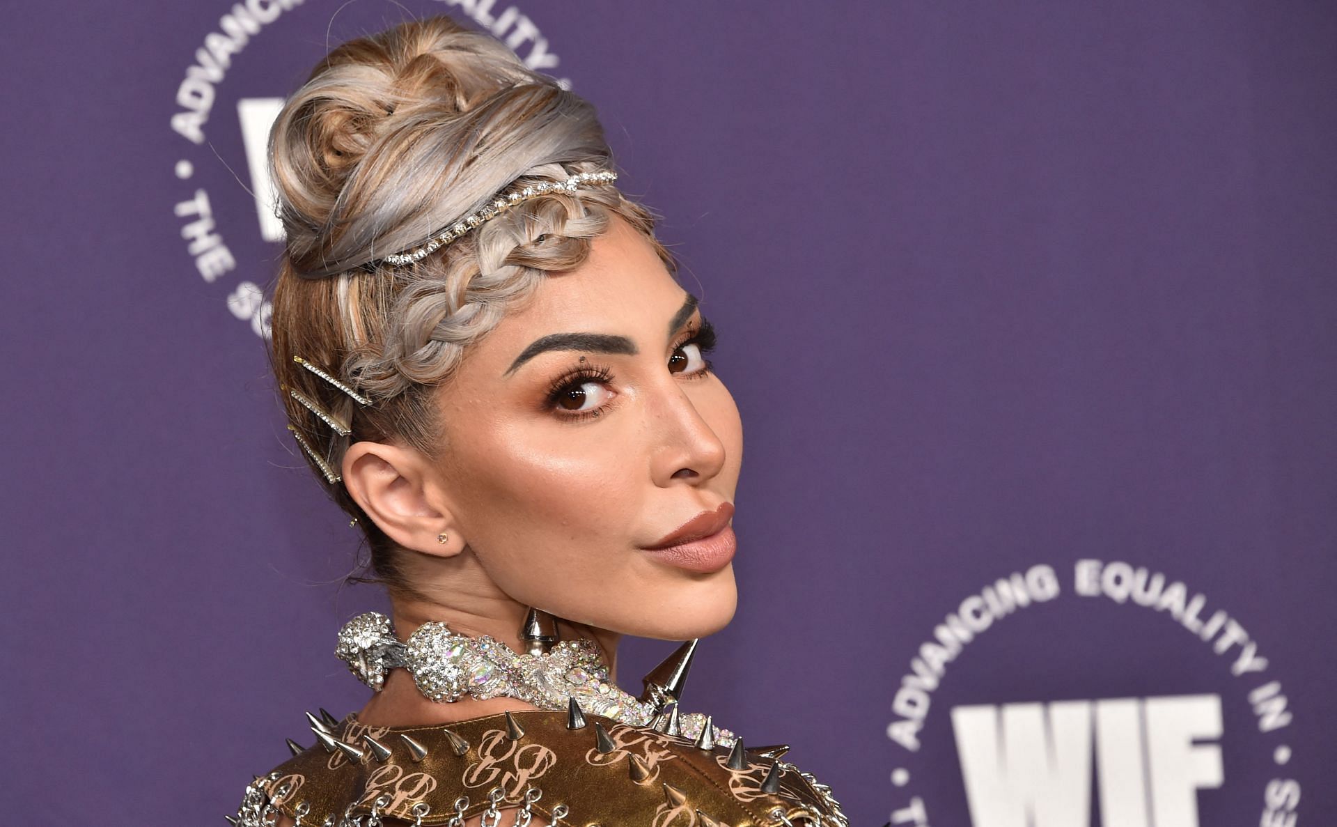Farrah Abraham was taken into custody for allegedly assaulting a security guard in a Hollywood-based club (Image via Getty Images/Chris Delmas/AFP)