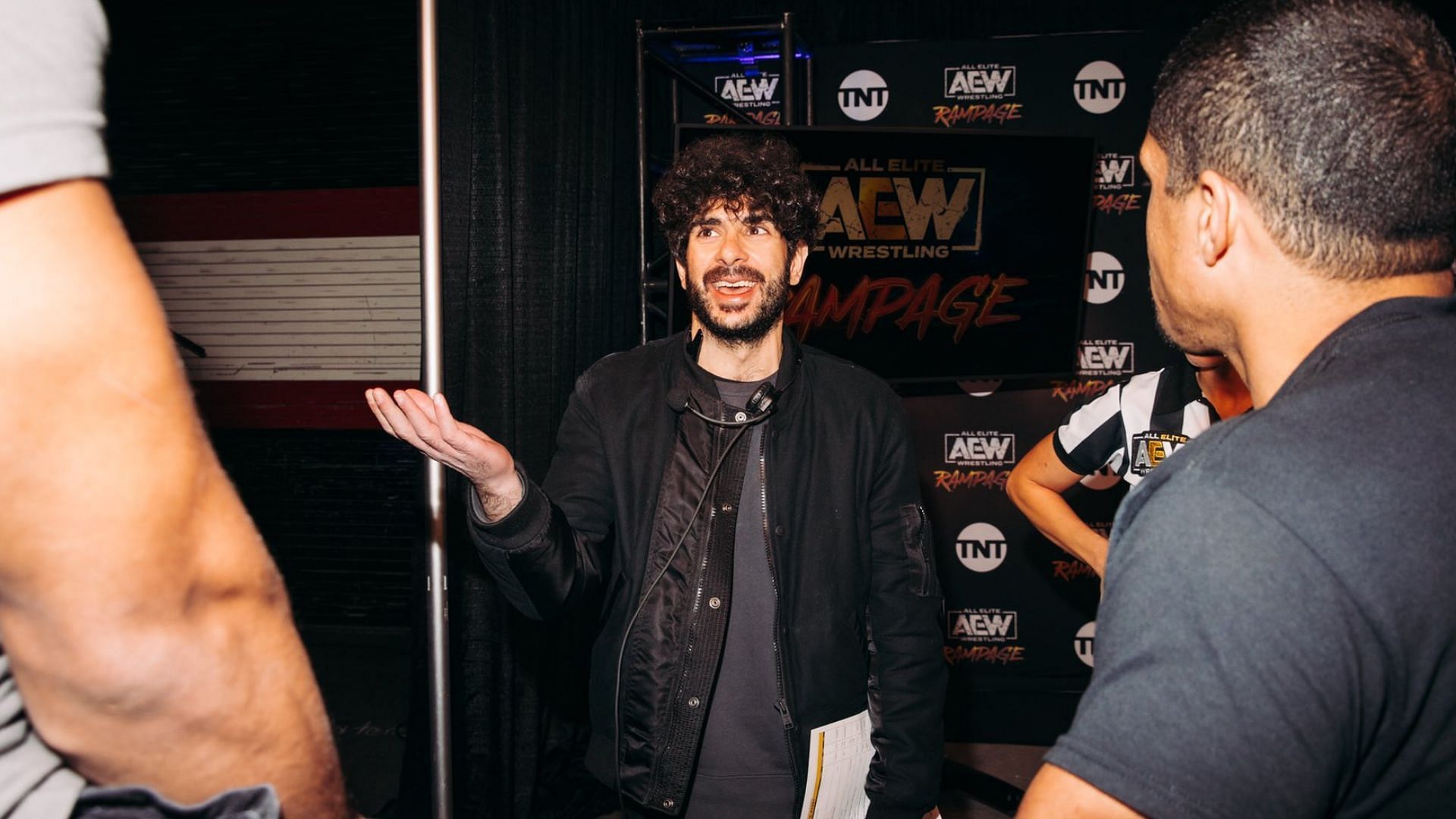 Tony Khan backstage at an AEW event in 2022