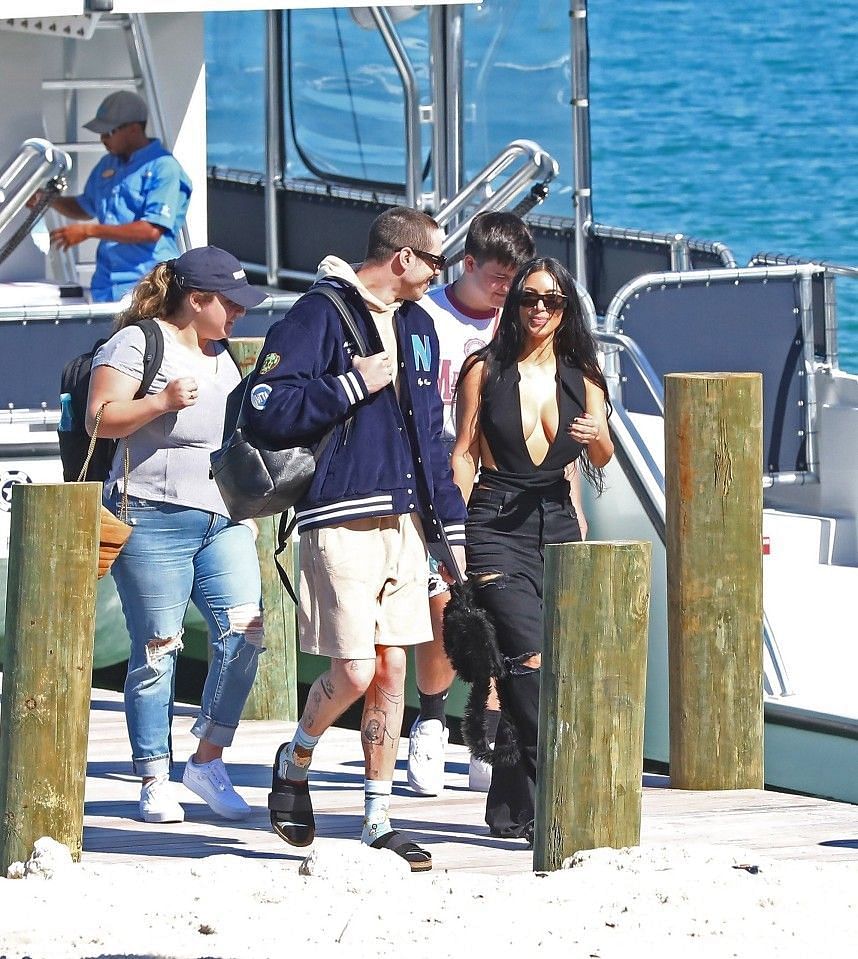 Kim Kardashian and Pete Davidson during their return from vacation (Image via CPR/D. Sanchez/BACKGRID)