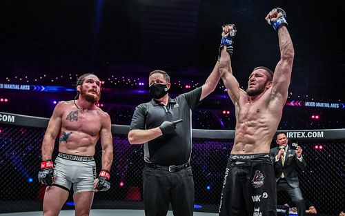 Saygid Izagakhmaev (right) submits James Nakashima (left) in his promotional debut. (Image courtesy of ONE Championship)