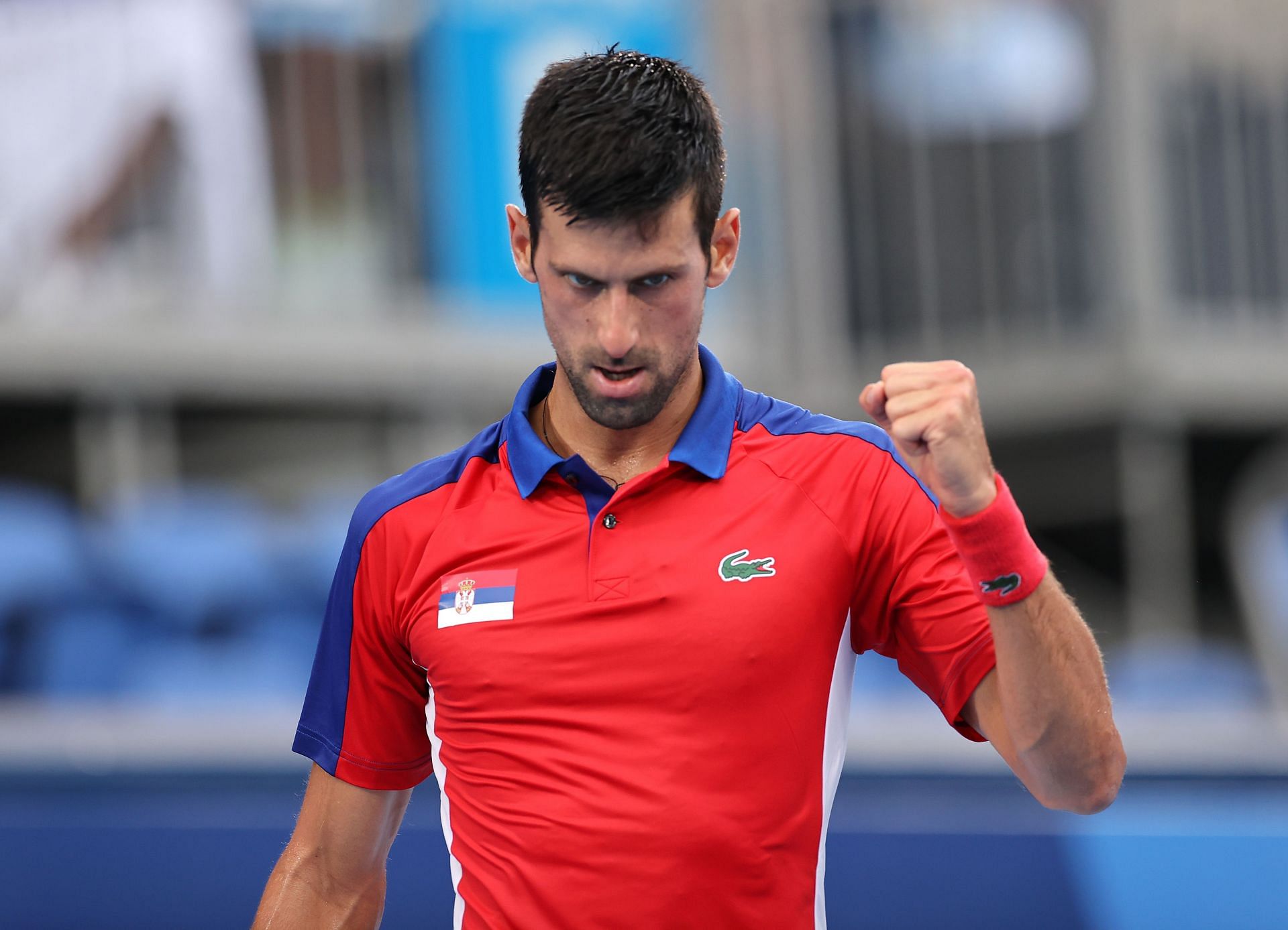 Djokovic wearing his Lacoste outfit during the Tokyo Olympics.