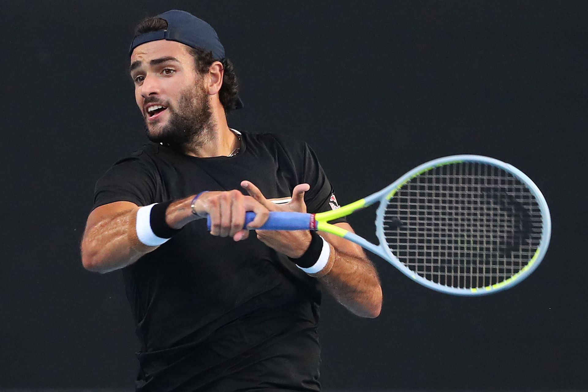 Matteo Berrettini after hitting a forehand